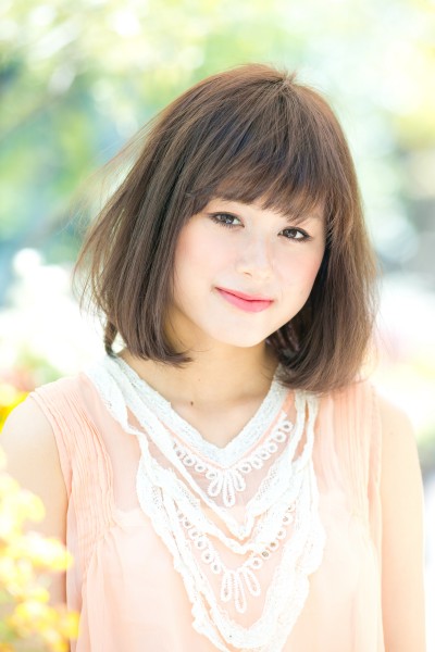 きちんとした印象を与える正統派のふんわりミディボブ